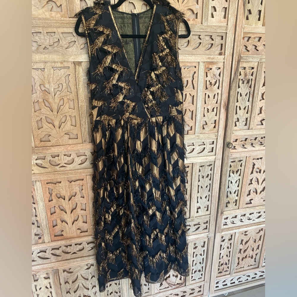 Dolce & Gabbana jumpsuit. Gold and Brown and amazing…side pockets, comfortable